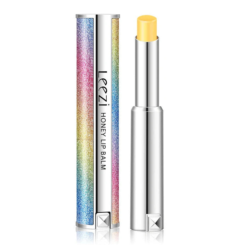 Rainbow Star colour changing lipstick tube showing honey shade transforming to pink on lips
