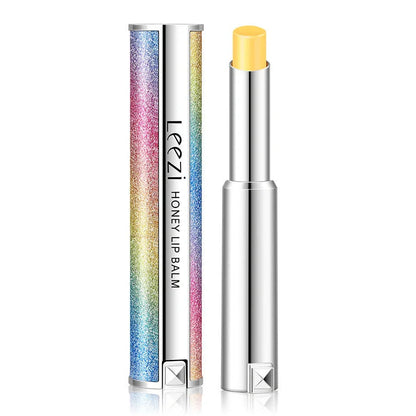 Rainbow Star colour changing lipstick tube showing honey shade transforming to pink on lips