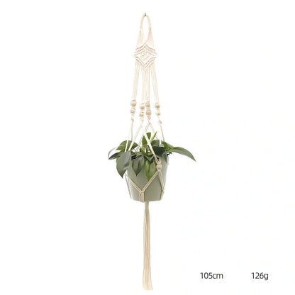 Hand-knitted cotton flowerpot net bag showing intricate pattern and hanging installation with plant
