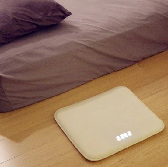 Smart pressure-sensitive alarm clock with LED display and memory foam base for comfortable, refreshing mornings