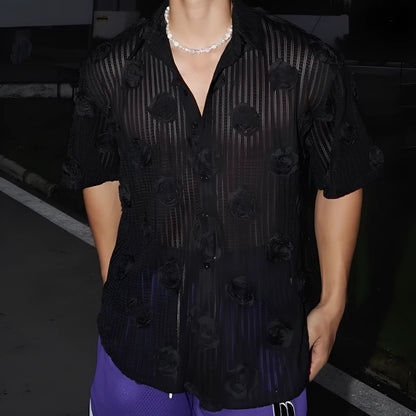 Men's loose fit floral print short sleeve shirt in black with a wool lining, shown on a mannequin.