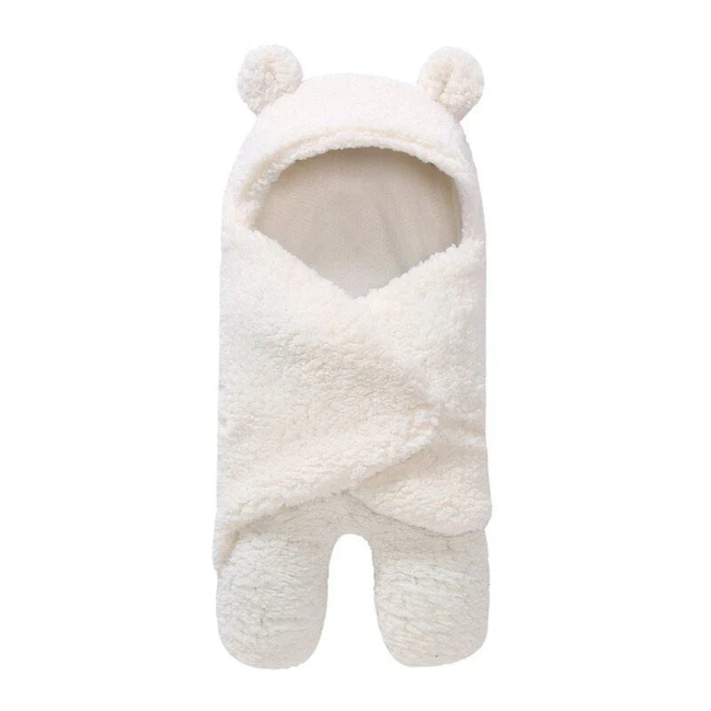 Cozy cotton baby sleeping bag with soft, breathable interior and warm, insulating outer layer