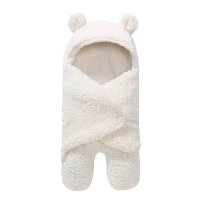 Cozy cotton baby sleeping bag with soft, breathable interior and warm, insulating outer layer
