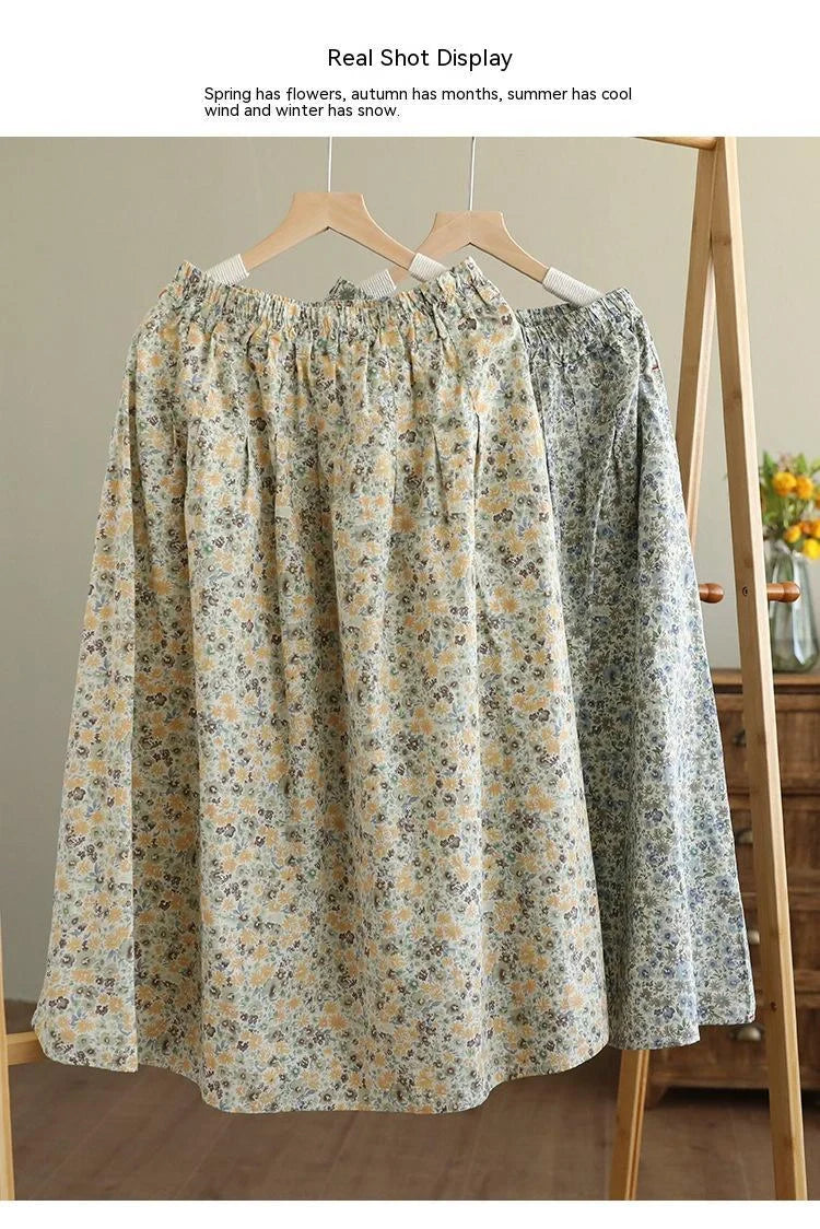 Elegant floral-printed cotton skirt with pleated design, available in yellow and blue flower patterns