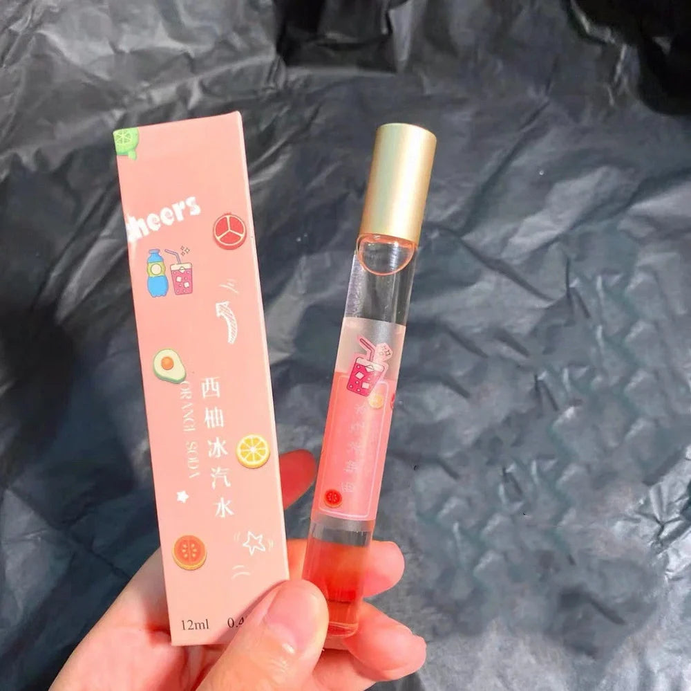 12ml glass rollerball essential oil fragrance bottle with Pure Gardenia label, featuring metal applicator for subtle scent application