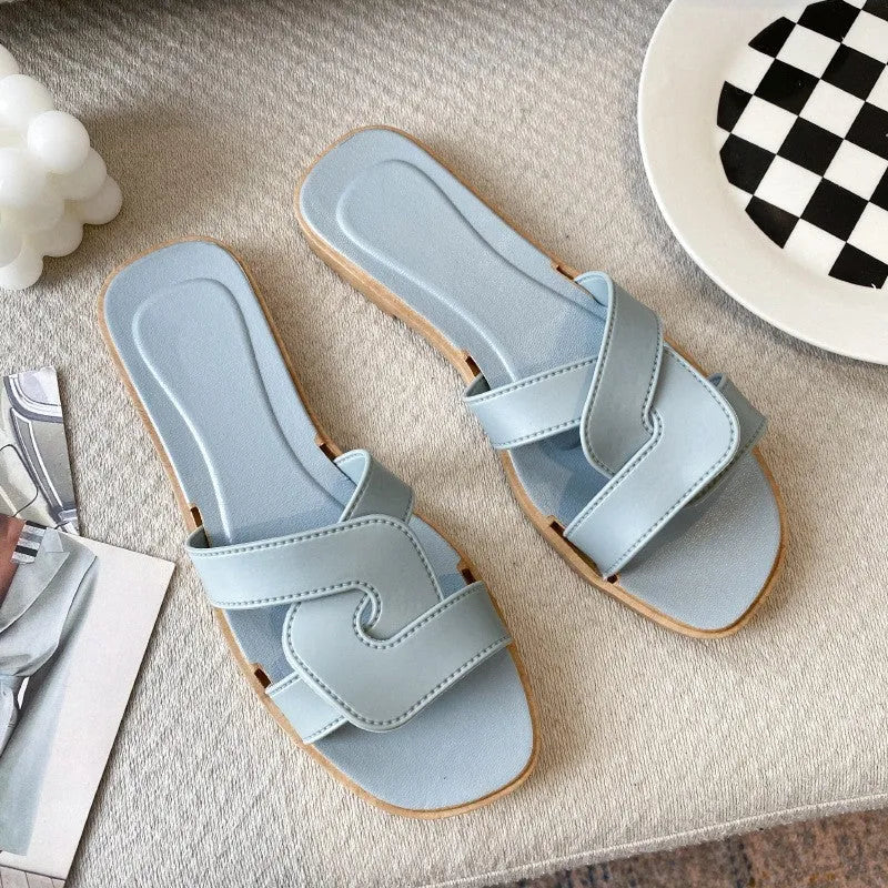 Women's PVC toe ring slippers with solid colour cross straps and non-slip sole