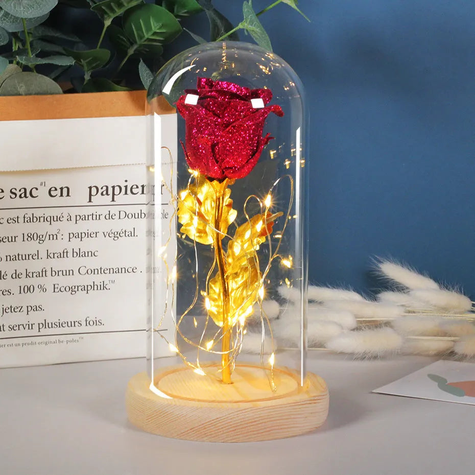Eternal rose in glass dome with LED string lights, colour options include red, gold, grey, rose red, blue, pink