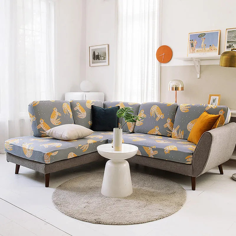 Sofa cover set with a plant flower pattern in a rustic style, shown on a sofa.