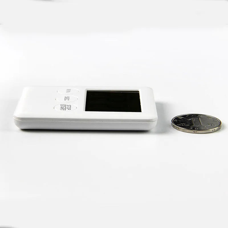 Digital kitchen timer with magnetic back showing countdown display in black or white options