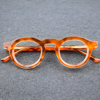 Box style hip-hop sunglasses with a thick colour-stitched plate frame on a solid background.