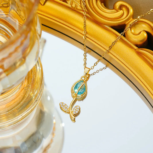 Zircon Tulip necklace with floral pendant on adjustable O-ring chain in gold colour options