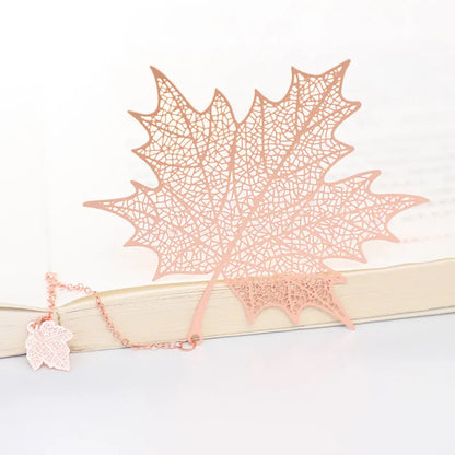 Brass metal bookmark with hollow plating leaf design and rose gold tassel decoration