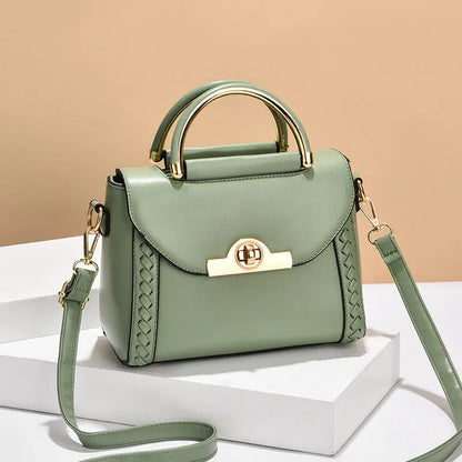 Women's PU leather crossbody messenger bag with double connector strap, soft handle, horizontal square shape, sold in black white or green