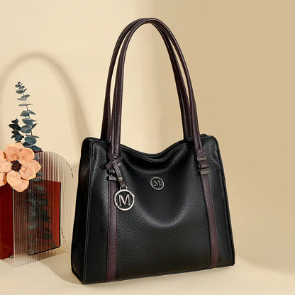 Soft black PU leather women's crossbody bag with double strap, showing outer sandwich pocket.