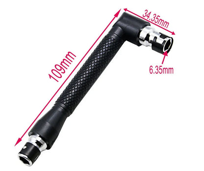 L-shaped double-headed socket wrench with ten screwdriver bits on steel background