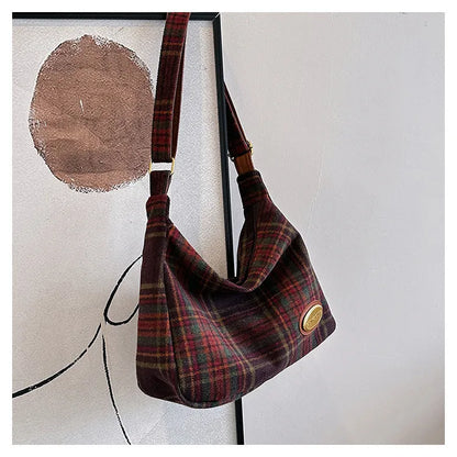 Women's large capacity woolen shoulder bag in brown with pendant attachment for autumn and winter use
