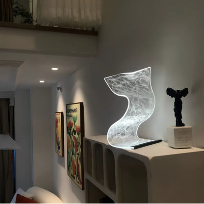 USB-powered bedside lamp with three colour settings and compact design