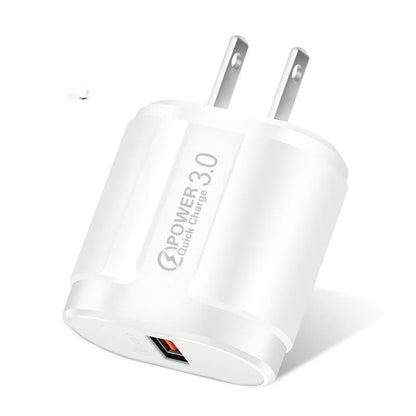 White and black USB mobile phone chargers with compact rectangular ABS plastic housings