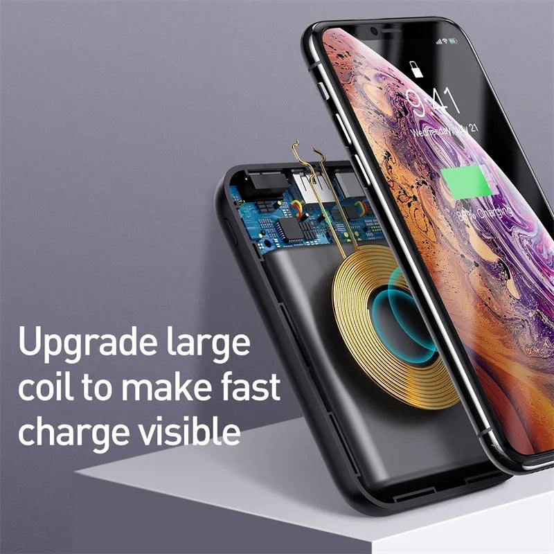 Small square black wireless charging power bank with LED display showing battery percentage.