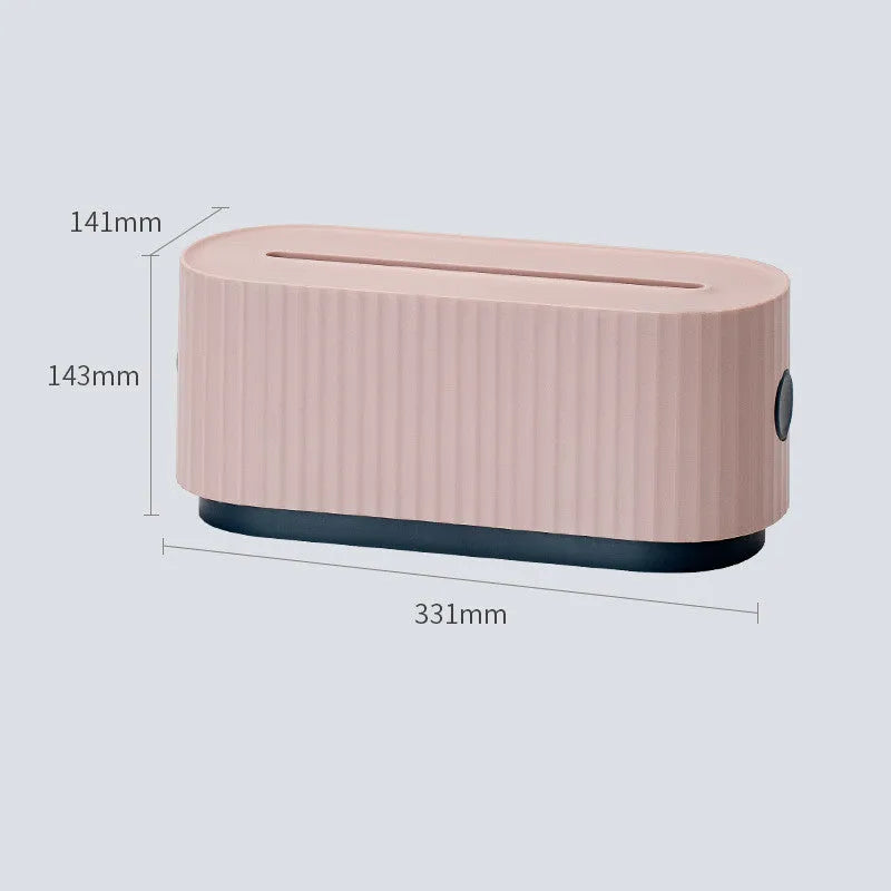 Blue desktop cable storage box with a white lid, showing cable ports on the base and a mobile phone sitting in its slot on top.