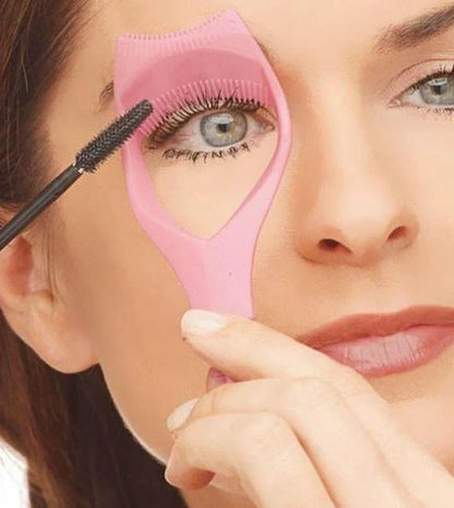 Pink and blue mascara shield with curved edge, 5 inches long by 1.5 inches wide