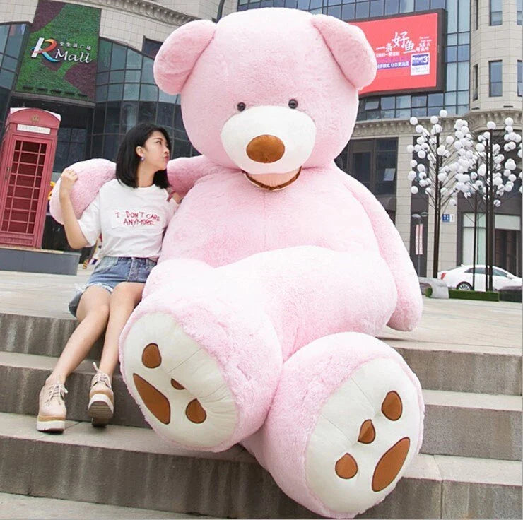 Colossal plush teddy bear in various sizes and colors, featuring a premium leather exterior and soft, cuddly interior
