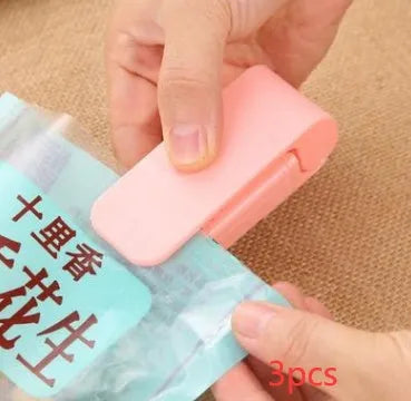 Portable ABS plastic bag sealer measuring 10x3.8x6cm with pressure heat sealing for snacks