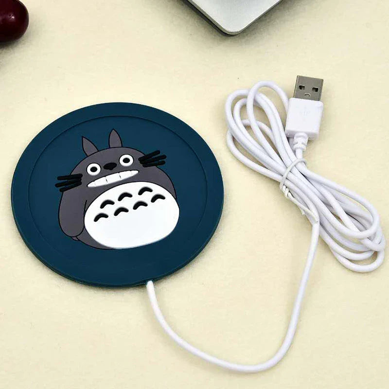 Cosy USB-powered heating pad with a soft rubber construction and a playful animal-inspired design, perfect for keeping mugs and cups warm