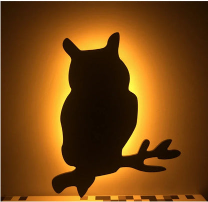 A stylish cat-themed LED lamp that automatically lights up when it detects sound, creating a cozy, ambient glow in a room.