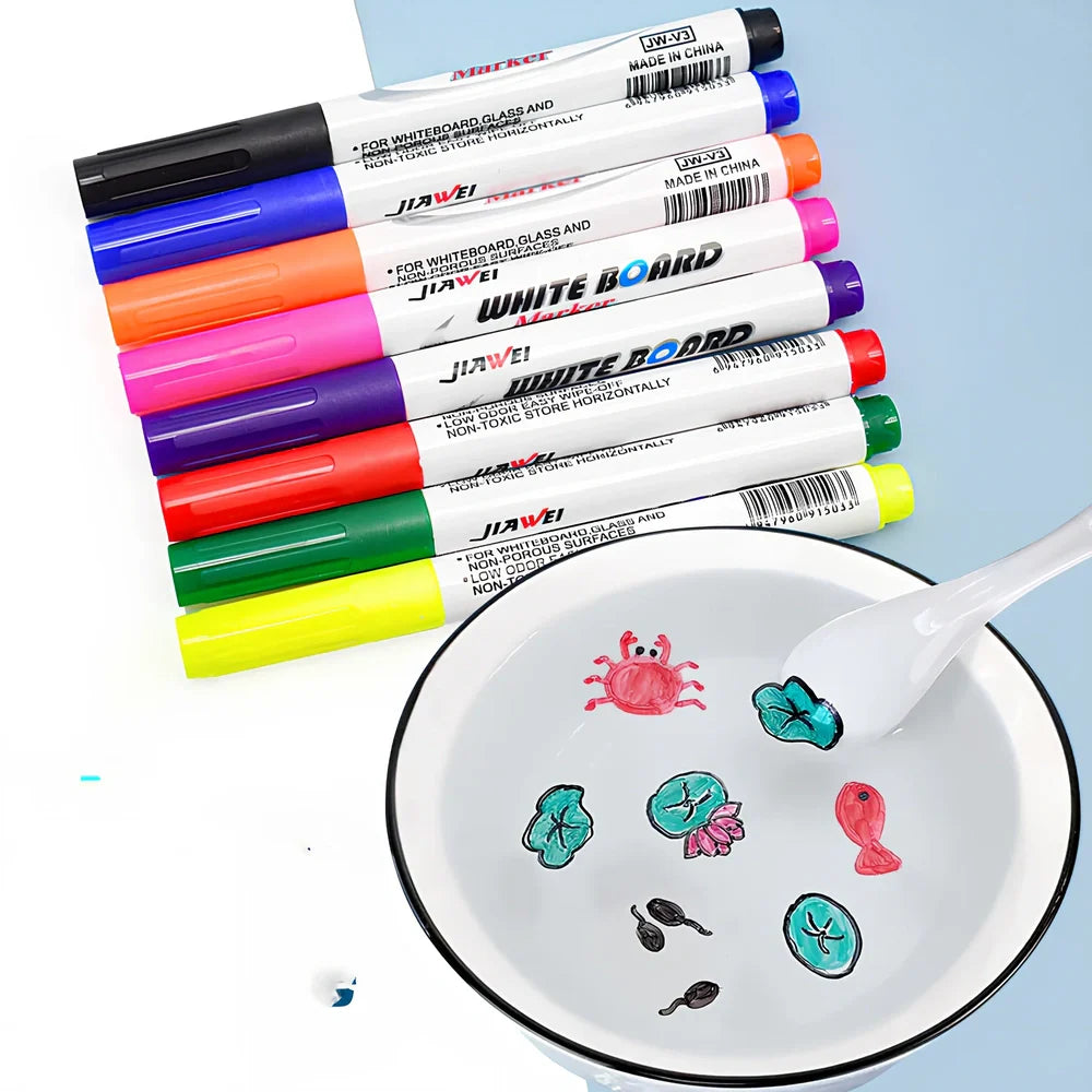 Children's floating water painting pens with oil-based colours and plastic spoon for creating temporary artwork
