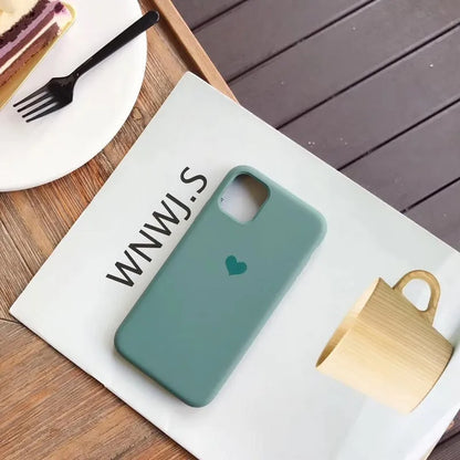 Solid colour silicone iPhone case shown in six colour options including dark green, flour and light pink.