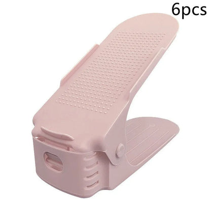 A stackable plastic shoe storage cabinet with two open shelves, shown in a choice of colours.