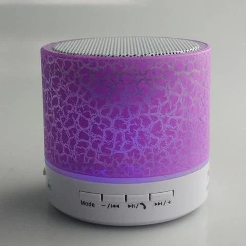 Compact wireless Bluetooth speakers in various colours, featuring premium audio components and sleek, durable design