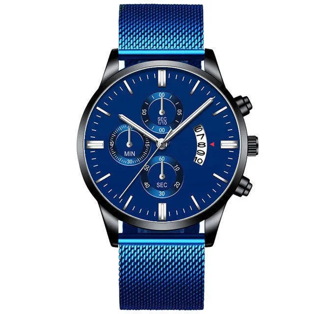 Men's stainless steel mesh band quartz watch with analog dial on a wrist.