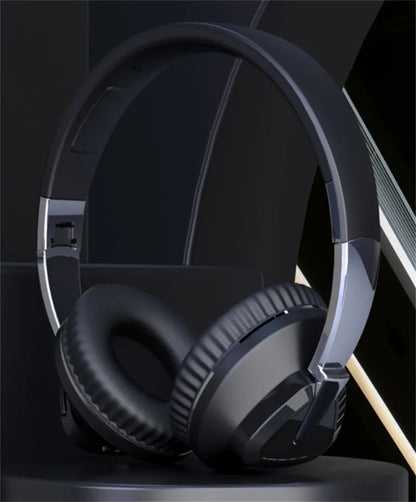 H3 wireless over-ear headset in black showing AUX port and on-ear controls.