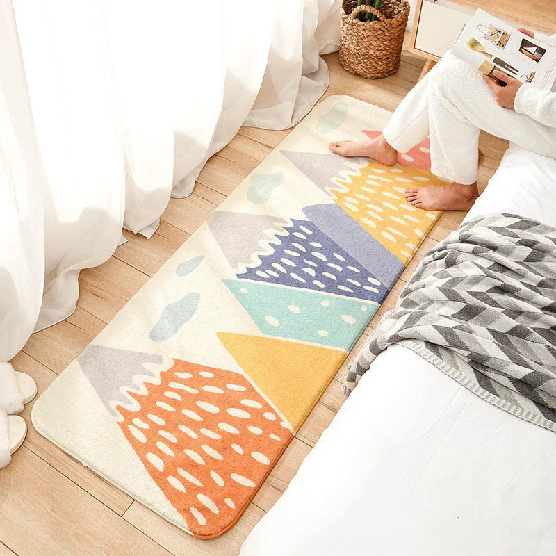 Colorful cartoon-themed floor mat with soft, plush microfiber material and non-slip backing for enhanced comfort and safety in any room.