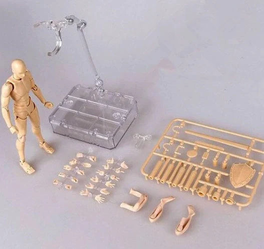 Articulated artist mannequin kit with interchangeable hands and accessories