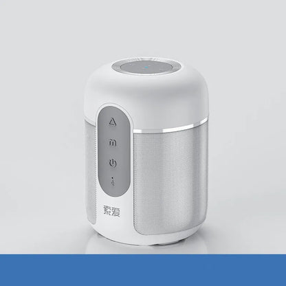 Compact black portable Bluetooth speaker with 30W output and 1500mAh battery, shown on a table.