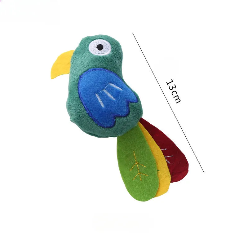 Plush cat toy in cow, crocodile, or parrot shape with colourful fabric and embroidered details.