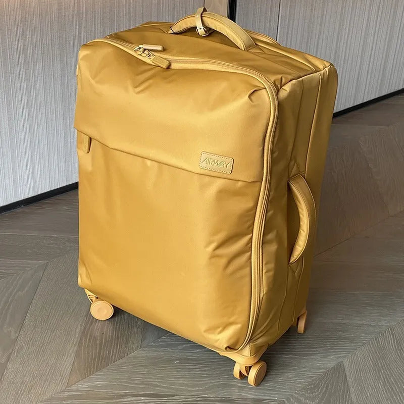 Ultra-light waterproof Oxford cloth suitcase in bluestone green with universal wheels showing 20-inch size dimensions