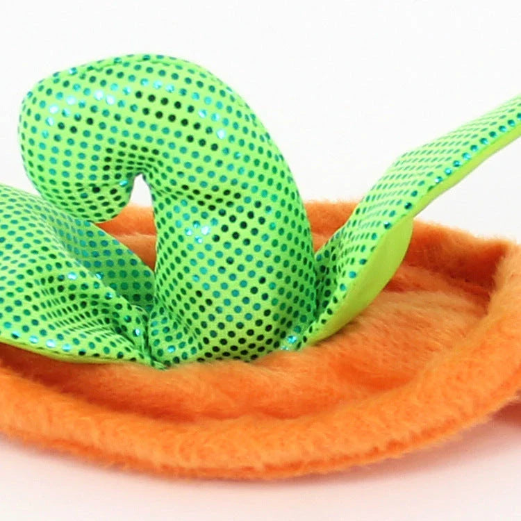 Pumpkin-themed Halloween costume for cats, featuring a plush hat and dress with vibrant patterns and leaf accents
