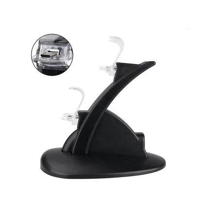 Black Xbox One dual controller charging station with two controllers docked