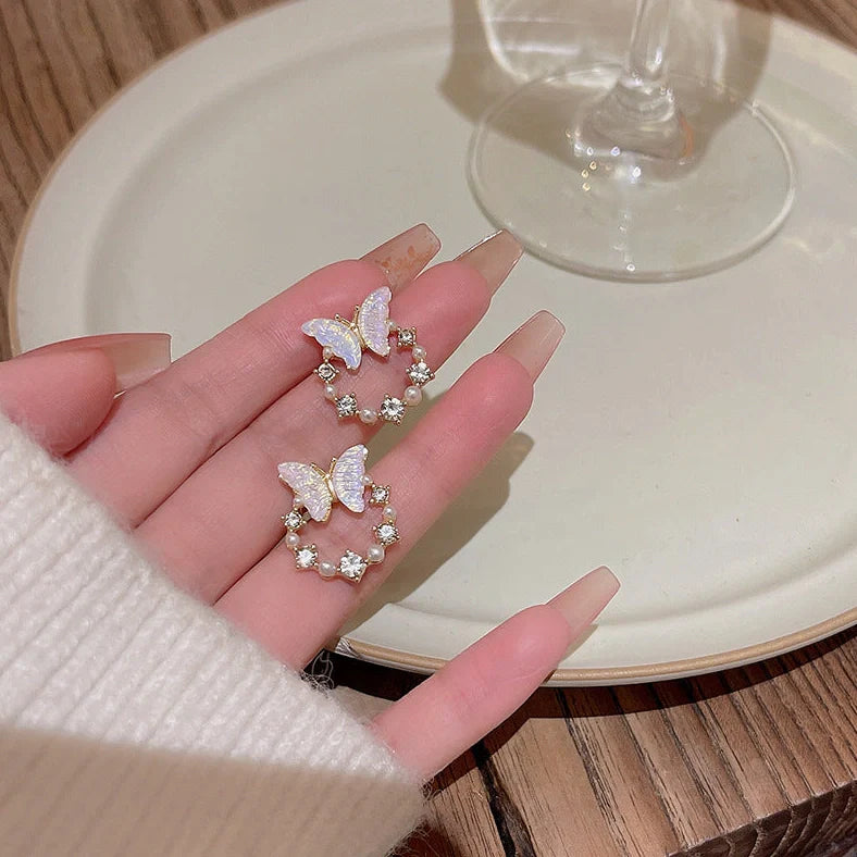 Gold electroplated floral earrings with pearl accents on S925 silver posts