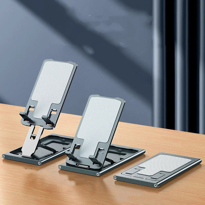 Aluminum alloy mobile phone stand in grey, rose gold, silver, and blue, adjustable angle for desktop use