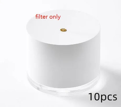 White portable ultrasonic humidifier with LED light and USB charging port on a wooden surface.