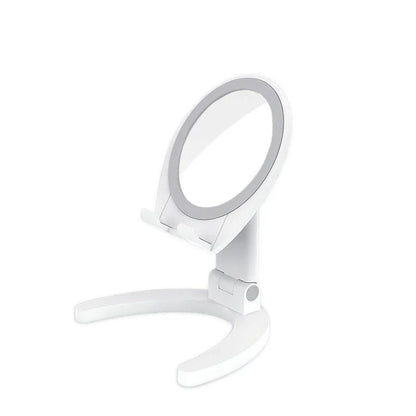 Adjustable phone stand with built-in makeup mirror for hands-free viewing and on-the-go grooming