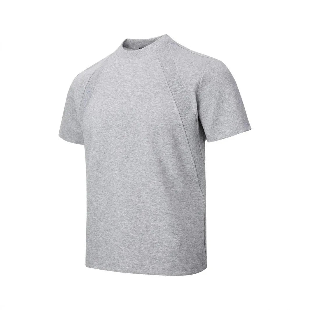 Loose-fit black short sleeve top with textured air layer stitching on a mannequin.