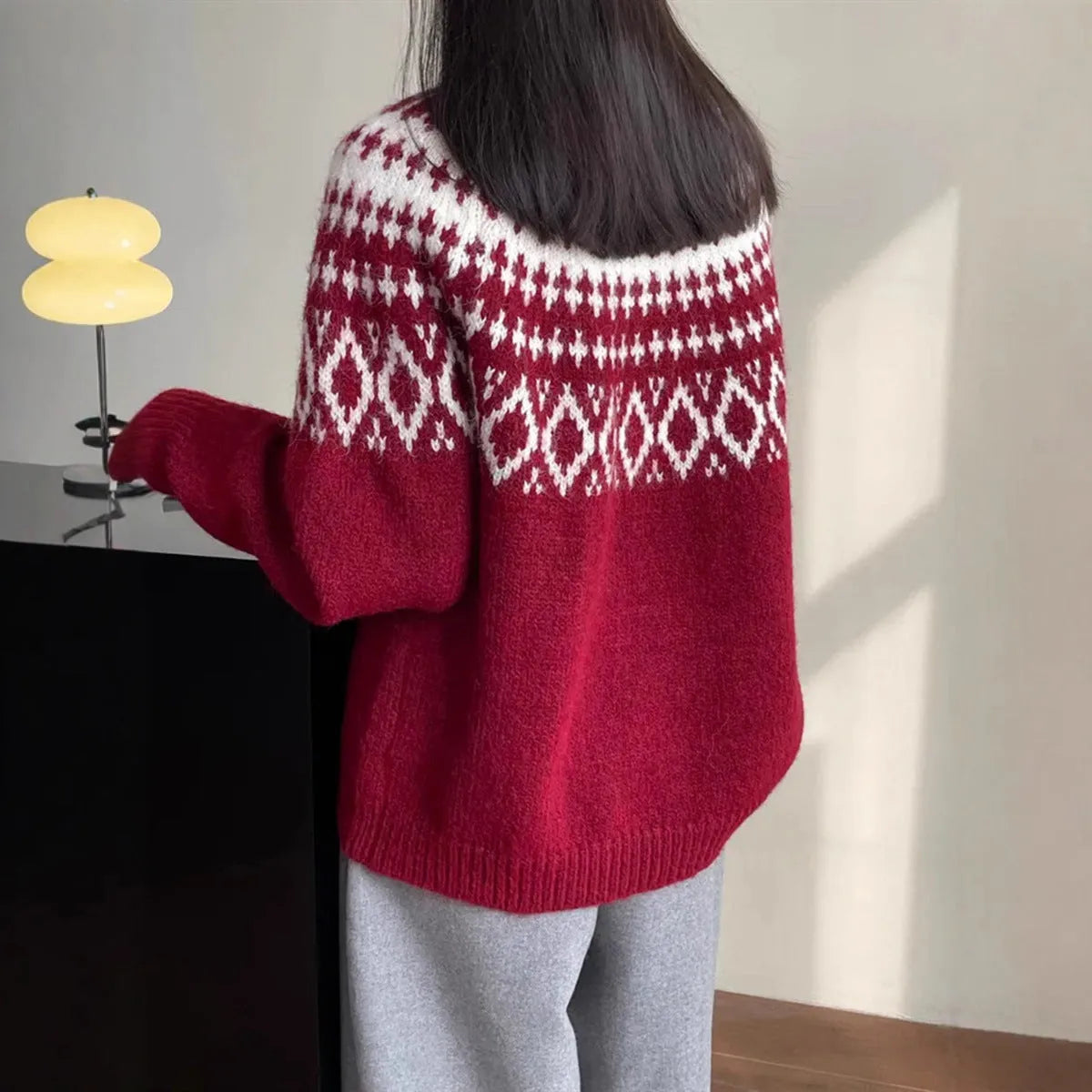 Round neck Christmas knitwear top in brown, red, or black with geometric pattern, long sleeves, loose fit, and 50cm length