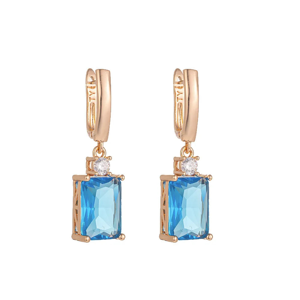 Square geometric earrings with gold electroplated finish on copper base