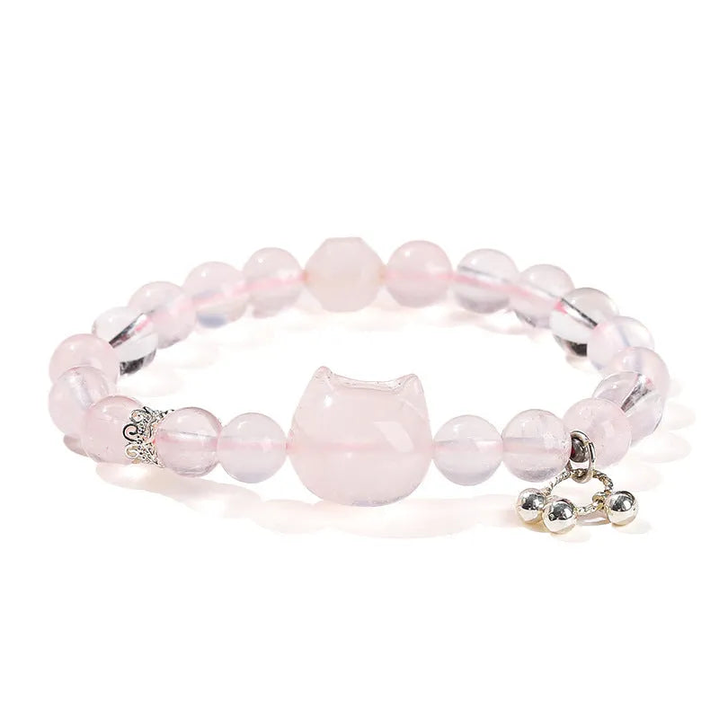 Women's geometric cat head bracelet with pink crystal beads and copper setting